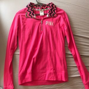 Pink quarter-zip sweater